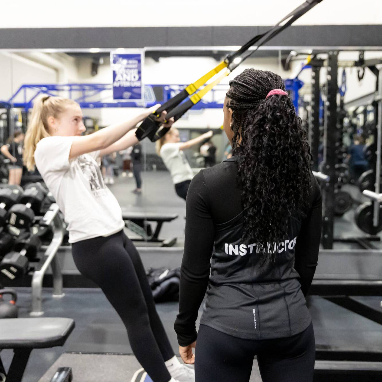 fitness instructor giving guidance